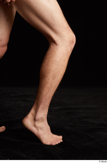 Gruffydd  1 calf flexing nude side view 0006.jpg